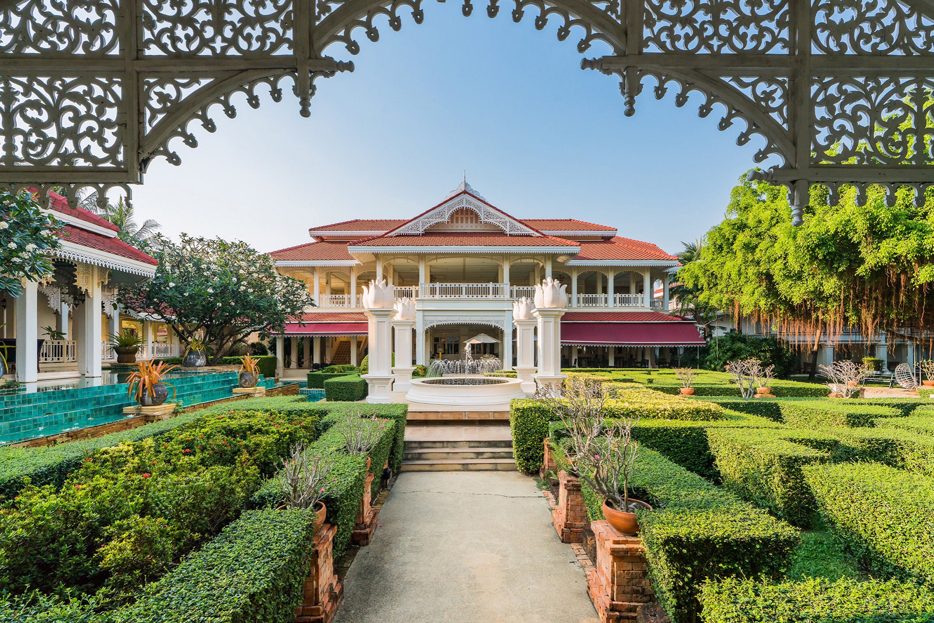 Colonial-style main building and garden at Wora Bura, Hua Hin